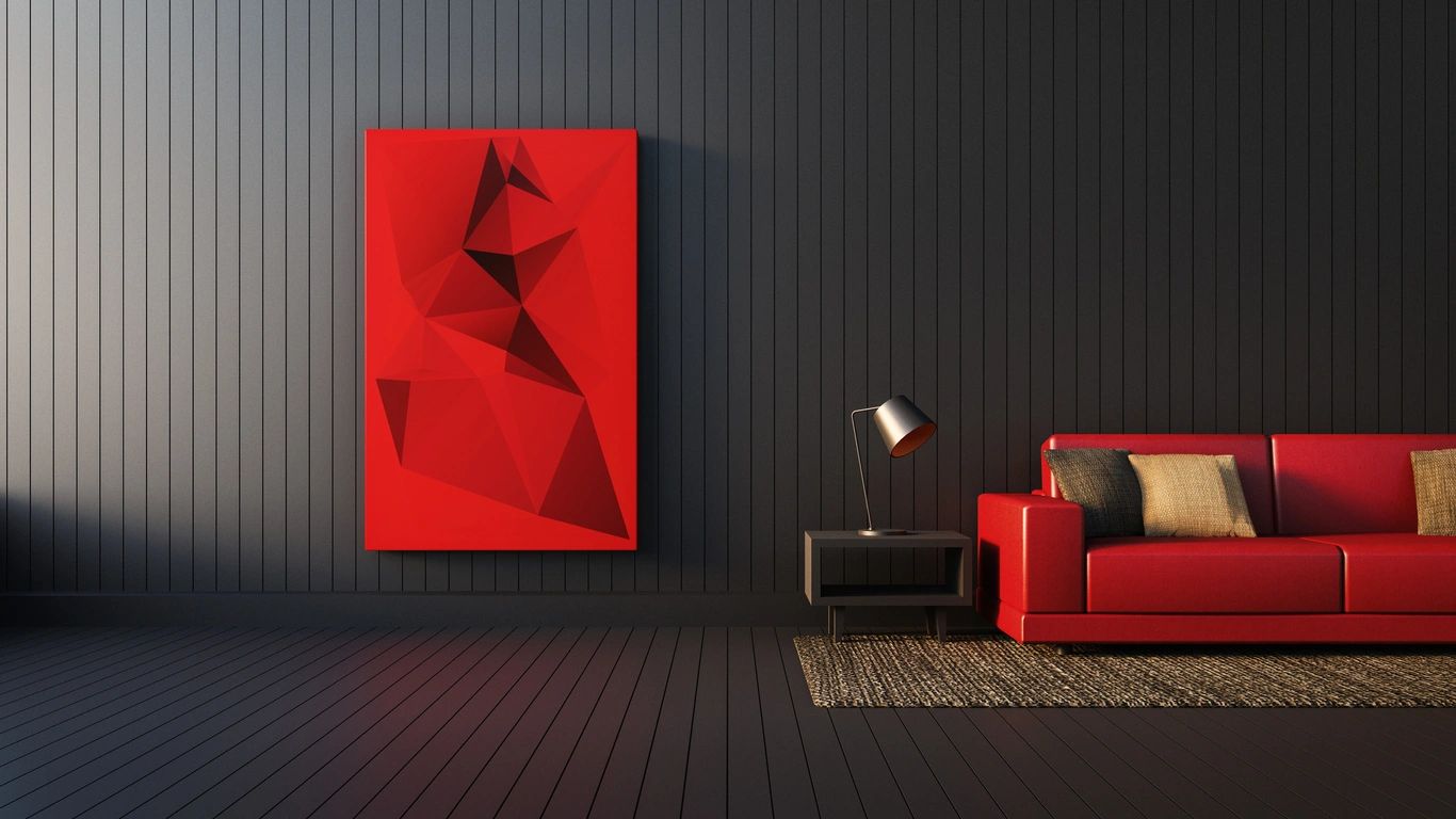 A red couch and lamp in a room.